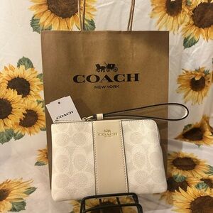 Coach Cream Wristlet with Gold Accents